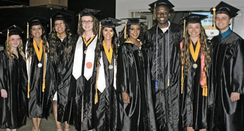 graduates in caps and gowns 