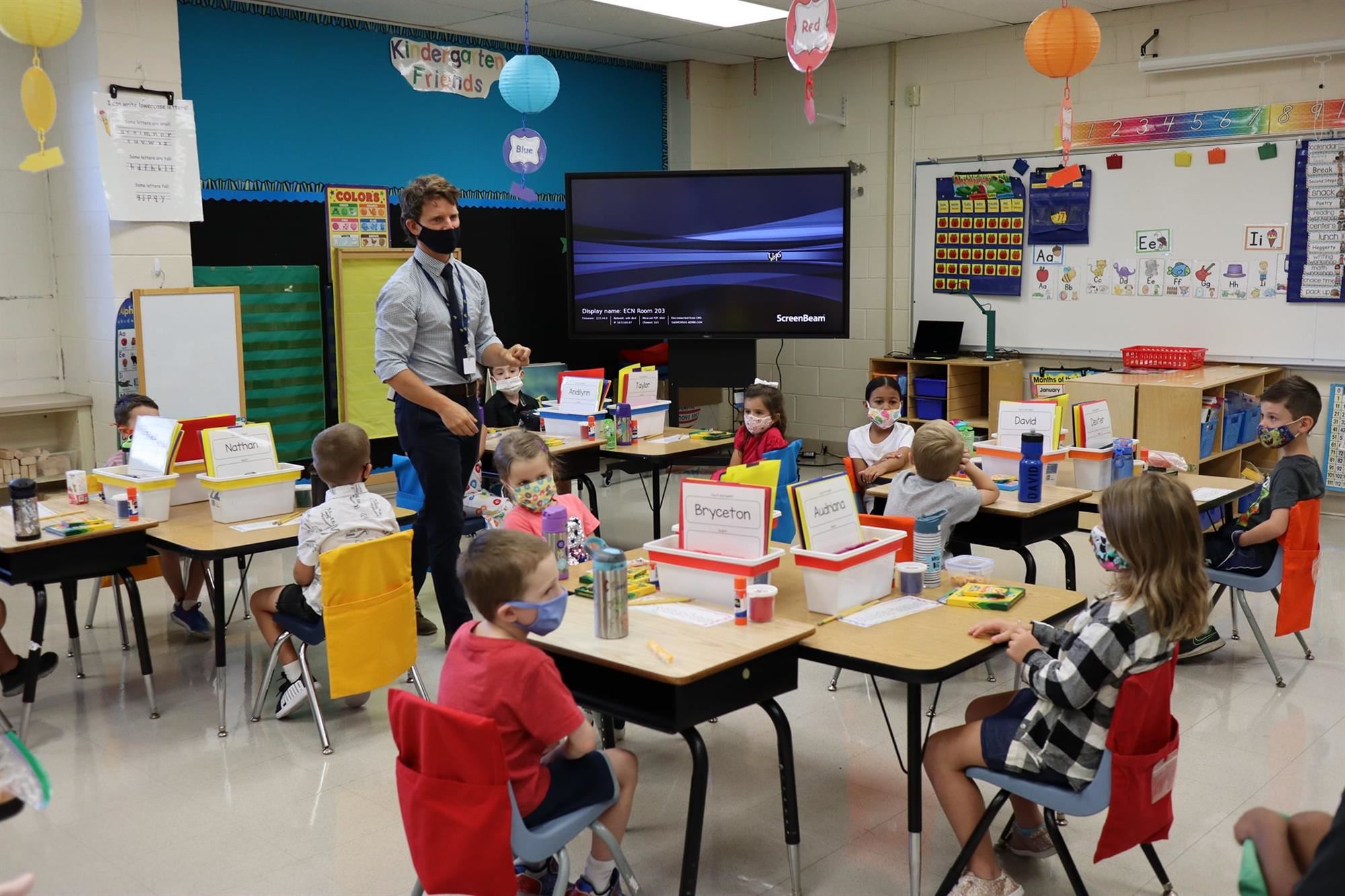 students in classroom with masks