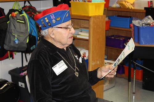 Johnny Vargas reads a letter written by a student at Garfield Elementary 