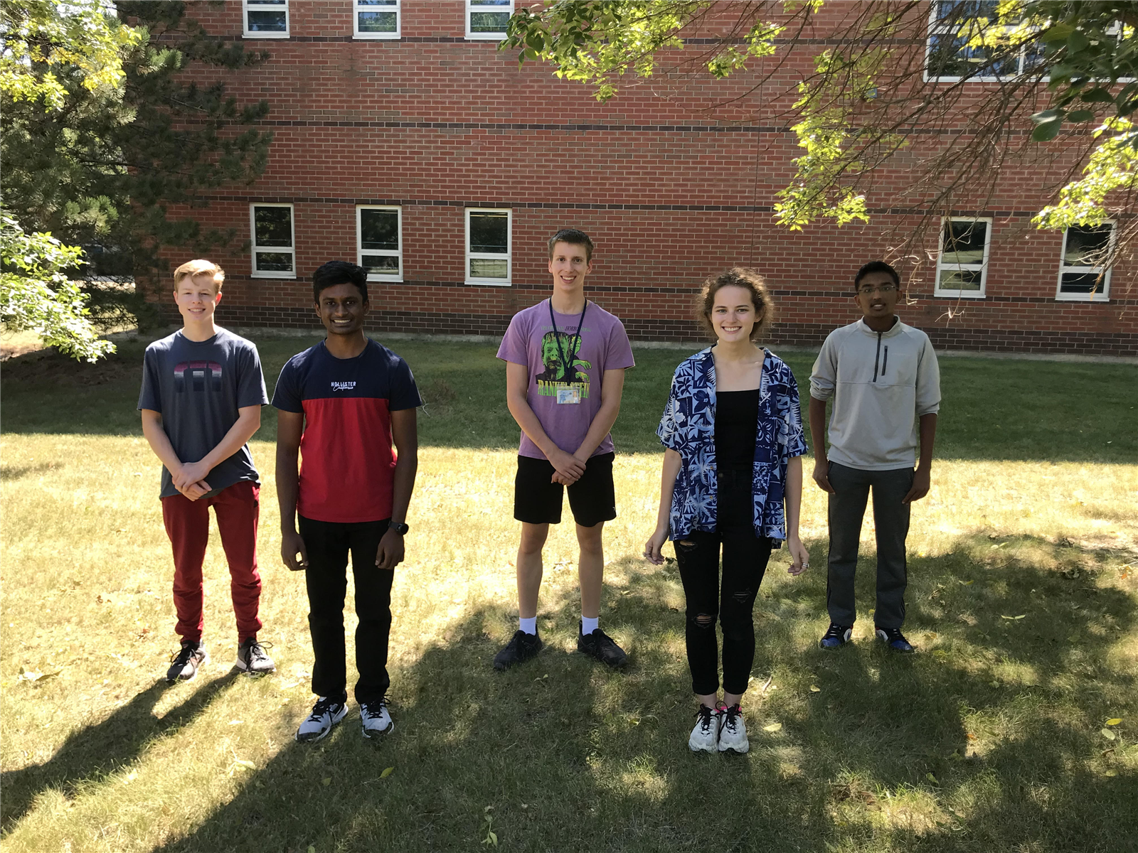 Five Bartlett High School Students stand together outside 