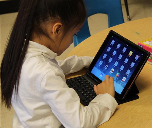 Student with iPad 